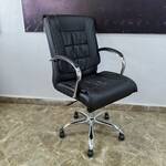Stylish rotating leather mid-back office chair offering ergonomic support and a sleek design for any workspace.