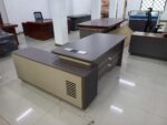 executive office desks price at Gucca Furniture Kenya. office desk, office desks, office table, office tables, office work desk, office work table, office computer desk, office computer table, office workstation desk, office writing desk, office study desk, office furniture desk, modern office desk, contemporary office desk, professional office desk, corporate office desk, commercial office desk, business office desk, executive office desk, staff office desk, manager office desk, office desk for office, office desk for home office, office desk for study, office desk for work, office desk for corporate office, office desk for companies, office desk for startups, office desk for professionals, office desk for employees, office desk for managers, office desk for executives, wooden office desk, MDF office desk, laminated office desk, metal office desk, steel office desk, glass top office desk, office desk with drawers, office desk with storage, office desk with cabinet, office desk with shelves, office desk with pedestal, office desk with filing cabinet, office desk with keyboard tray, office desk with CPU stand, office desk with cable management, L shaped office desk, straight office desk, U shaped office desk, corner office desk, compact office desk, small office desk, large office desk, minimalist office desk, ergonomic office desk, height adjustable office desk, electric office desk, sit stand office desk, fixed height office desk, office desk 120cm, office desk 140cm, office desk 160cm, office desk 180cm, office desk 200cm, office desk 240cm, office desk black, office desk white, office desk brown, office desk grey, office desk wood finish, office desk walnut finish, office desk oak finish, office desk mahogany finish, office desk for laptop, office desk for desktop, office desk for computer setup, office desk for productivity, office desk heavy duty, office desk durable, office desk scratch resistant, office desk easy maintenance, office desk modern design, office desk stylish, office desk affordable, office desk price, office desk cost, office desk for sale, buy office desk online, best office desk, office desk supplier, office desk manufacturer, office desk distributor, office desk wholesaler, office desk bulk supply, office desk wholesale Kenya, office desk furniture shop, office desk showroom, office desk Kenya, office desk Nairobi, office desk delivery Kenya, office desk installation, office desk office furniture Kenya