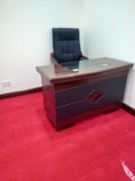 office desks price at Gucca Furniture Kenya. executive office desk, executive office desks, executive desk kenya, executive office desk kenya, office executive desk kenya, executive desk nairobi, executive table kenya, manager desk kenya, director desk kenya, buy executive office desk kenya, executive office desk for sale kenya, executive office desk price kenya, affordable executive office desk kenya, cheap executive office desk kenya, best executive office desk kenya, modern executive office desk kenya, luxury executive desk kenya, premium executive office desk kenya, imported executive desk kenya, wooden executive office desk kenya, CEO office desk kenya, corporate office desk kenya, professional office desk kenya, executive desk with drawers kenya, executive desk with storage kenya, executive desk with side cabinet kenya, executive desk with shelves kenya, executive desk with file drawers kenya, executive desk with cable management kenya, L shaped executive desk kenya, executive corner desk kenya, spacious executive desk kenya, large executive desk kenya, contemporary executive desk kenya, stylish executive desk kenya, durable executive desk kenya, heavy duty executive desk kenya, custom executive desk kenya, office workstation desk kenya, business office desk kenya, executive office furniture kenya, office furniture executive desk kenya, executive desk supplier kenya, executive desk shop nairobi, executive desk showroom kenya, executive desk online kenya, wholesale executive desks kenya, bulk executive desks kenya, executive desk deals kenya, executive desk offers kenya, executive desk discounts kenya, executive desk delivery kenya, executive desk installation kenya, premium office furniture kenya, executive workstation kenya, luxury office furniture kenya